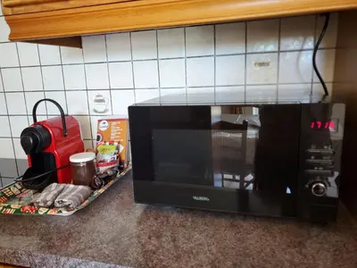 Cuisine ou kitchenette dans l'établissement Oncle xa