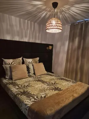 Un ou plusieurs lits dans un hébergement de l'établissement Cosy Loft - Appartement de charme