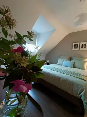 Un ou plusieurs lits dans un hébergement de l'établissement Maison et Florescence
