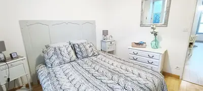 Un ou plusieurs lits dans un hébergement de l'établissement Appartement cosy à 2 pas des rues piétonnes