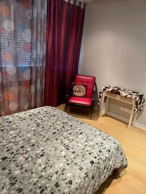 Un ou plusieurs lits dans un hébergement de l'établissement Appartement à 2 pas de la gare