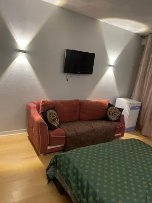 Télévision ou salle de divertissement dans l'établissement Appartement à 2 pas de la gare