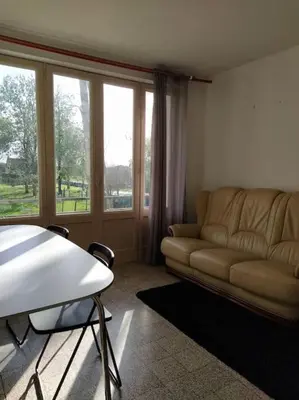 Coin salon dans l'établissement Maison 3 chambres 6 lits Netflix Parking