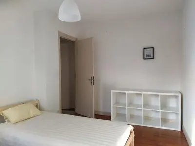 Un ou plusieurs lits dans un hébergement de l'établissement Maison 3 chambres 6 lits Netflix Parking