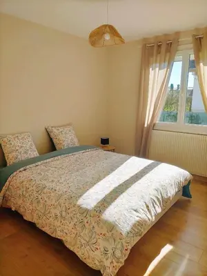Un ou plusieurs lits dans un hébergement de l'établissement L'étape Nuitonne - Gîte avec jardin pour 6 personnes