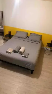 Un ou plusieurs lits dans un hébergement de l'établissement LE BERLIER 60m2 + COUR PRIVÉE - CENTRE HISTORIQUE