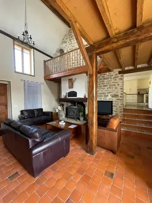 Coin salon dans l'établissement Gîte le Ch'armançon