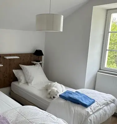 Un ou plusieurs lits dans un hébergement de l'établissement Gîte au Coeur du Jura entre Comté et Vin jaune, Gîte Vin Jaune