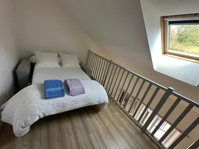Un ou plusieurs lits dans un hébergement de l'établissement Gîte au Coeur du Jura entre Comté et Vin jaune, Gîte Vin Jaune