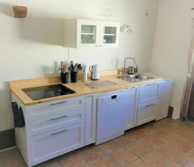 Cuisine ou kitchenette dans l'établissement La Chouette Burgonde