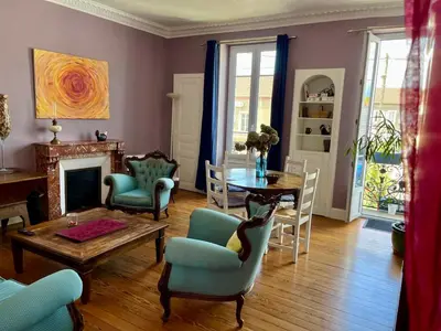 Coin salon dans l'établissement Gîte au Balcon