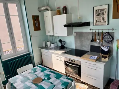 Cuisine ou kitchenette dans l'établissement Gîte au Balcon
