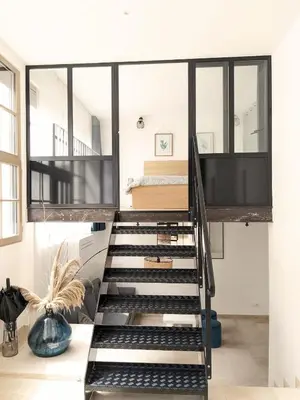 Télévision ou salle de divertissement dans l'établissement Loft Esprit & Lumière