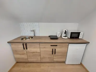 Cuisine ou kitchenette dans l'établissement Famille House 201