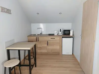 Cuisine ou kitchenette dans l'établissement Famille House 202