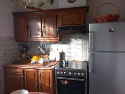 Cuisine ou kitchenette dans l'établissement La maison des amoureux de ballades dans le Jura