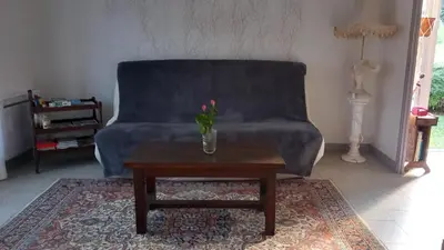 Coin salon dans l'établissement La maison des amoureux de ballades dans le Jura