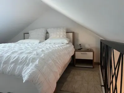 Un ou plusieurs lits dans un hébergement de l'établissement Home prestige 21