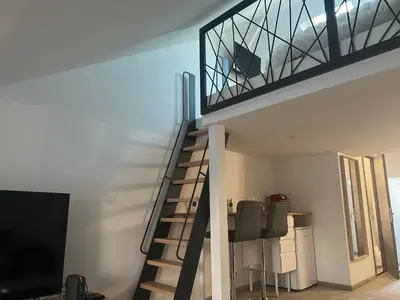 Télévision ou salle de divertissement dans l'établissement Home prestige 21