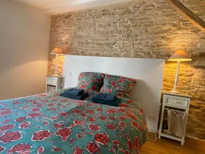 Un ou plusieurs lits dans un hébergement de l'établissement Maison de ville centre historique Fontaine Les Dijon