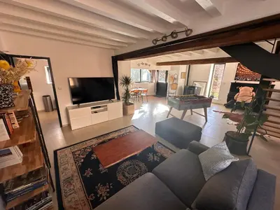 Télévision ou salle de divertissement dans l'établissement Le Pied du Loup - gîte proche Cluny au calme 6-7 personnes
