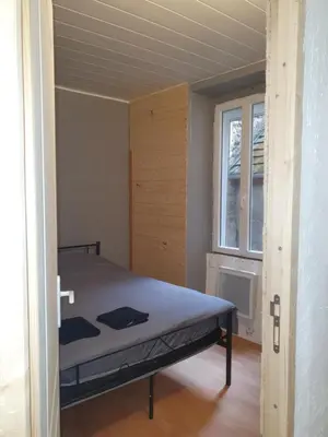 Un ou plusieurs lits dans un hébergement de l'établissement Appartement VanSuly 1