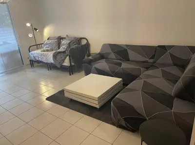 Coin salon dans l'établissement Maison entière Chenôve avec jardin