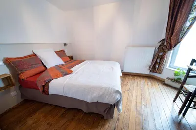 Un ou plusieurs lits dans un hébergement de l'établissement Appartement haut de gamme Centre ville