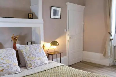 Un ou plusieurs lits dans un hébergement de l'établissement La Verrière - Chambre d'hôtes et gîte de charme