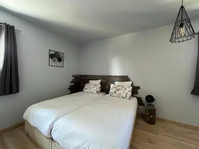 Un ou plusieurs lits dans un hébergement de l'établissement Hôtel En Tilleul