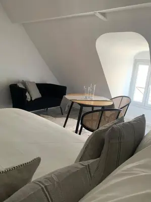 Coin salon dans l'établissement appartement catimini