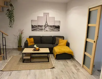 Coin salon dans l'établissement Le Duplex de Paris