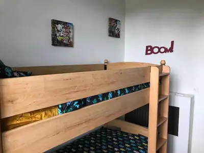 Un ou plusieurs lits dans un hébergement de l'établissement Le ptit Pont de Pany