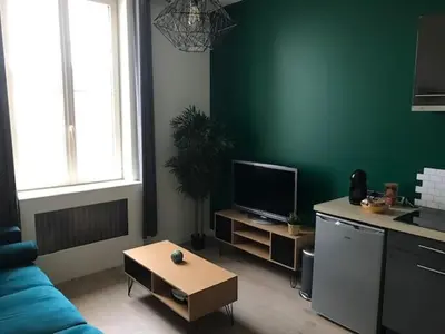 Télévision ou salle de divertissement dans l'établissement Le ptit Pont de Pany