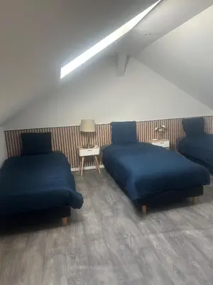 Coin salon dans l'établissement Le Duplex de l’Avenue