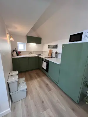 Cuisine ou kitchenette dans l'établissement Gîtes de la Chapelle