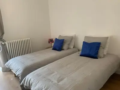 Un ou plusieurs lits dans un hébergement de l'établissement Maison Céleste