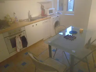 Cuisine ou kitchenette dans l'établissement le bienvenu