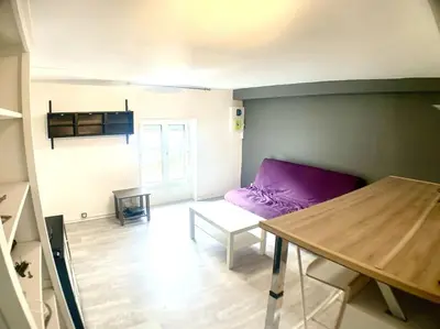 Coin salon dans l'établissement Le Transvaal : À deux pas du centre.