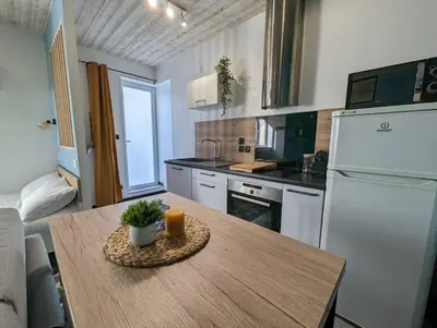 Cuisine ou kitchenette dans l'établissement Le Studio Pop