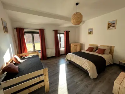 Un ou plusieurs lits dans un hébergement de l'établissement Coeur Chambertin