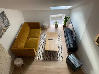 Coin salon dans l'établissement La chambrette