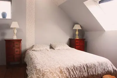 Un ou plusieurs lits dans un hébergement de l'établissement Gîte de charme en Hautes Côtes de Beaune