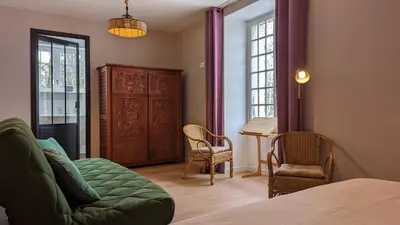 Coin salon dans l'établissement Le Mariotte et le Pralat