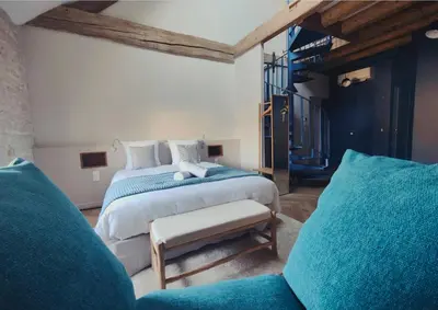 Un ou plusieurs lits dans un hébergement de l'établissement DOMAINE SAINT LOUP - 10min BEAUNE
