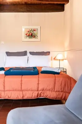 Un ou plusieurs lits dans un hébergement de l'établissement La Maison de Barbara