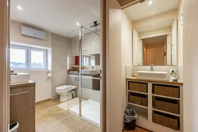 Salle de bains dans l'établissement La Maison de Barbara