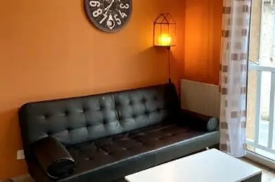Coin salon dans l'établissement Le Saint-Amour 2