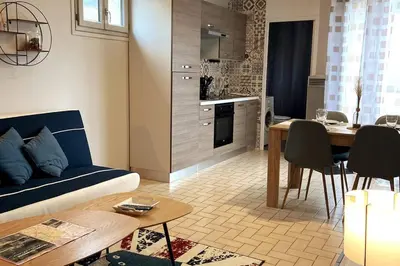 Cuisine ou kitchenette dans l'établissement Le Saint-Amour appartement classé 2 étoiles