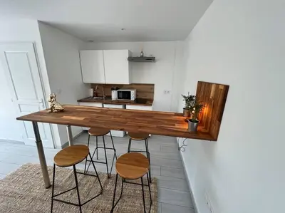 Cuisine ou kitchenette dans l'établissement La belle de Nuits